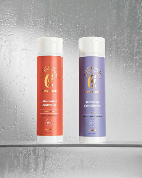 Curly Angels Absolution Shampoo and Salvation Conditioner picture near misty shower glass