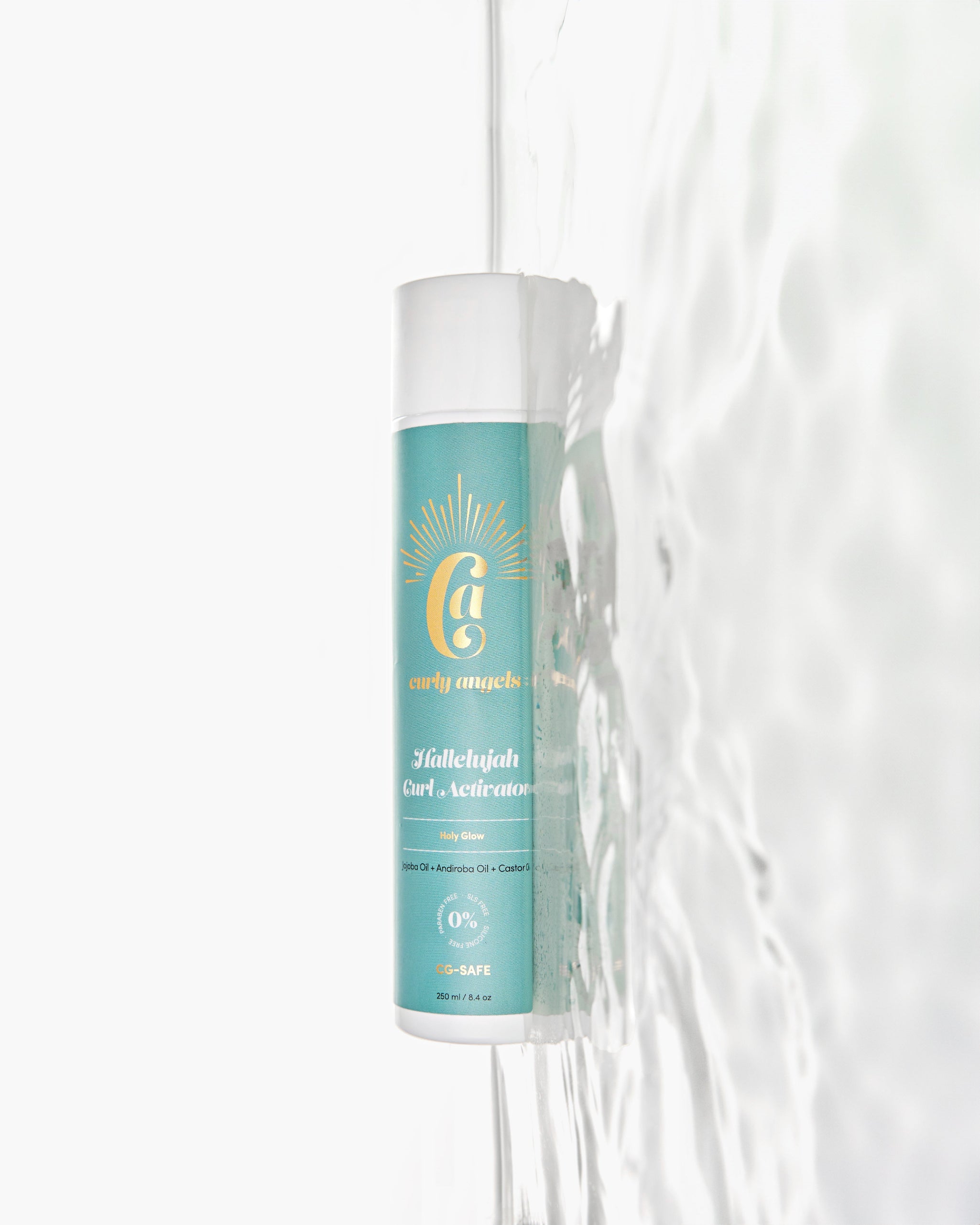 A bottle of Curly Angels vegan Hallelujah Curl Activator designed for enhancing and hydrating curls resting on water