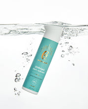 A bottle of Curly Angels vegan Hallelujah Curl Activator designed for enhancing and hydrating curls against splashing into water