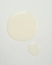 Curly Angels vegan Glorious Curling Gel two droplets on a white background